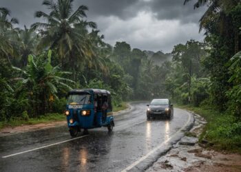 Heavy rain affecting road conditions in Sri Lanka during September 2026 weather alerts.